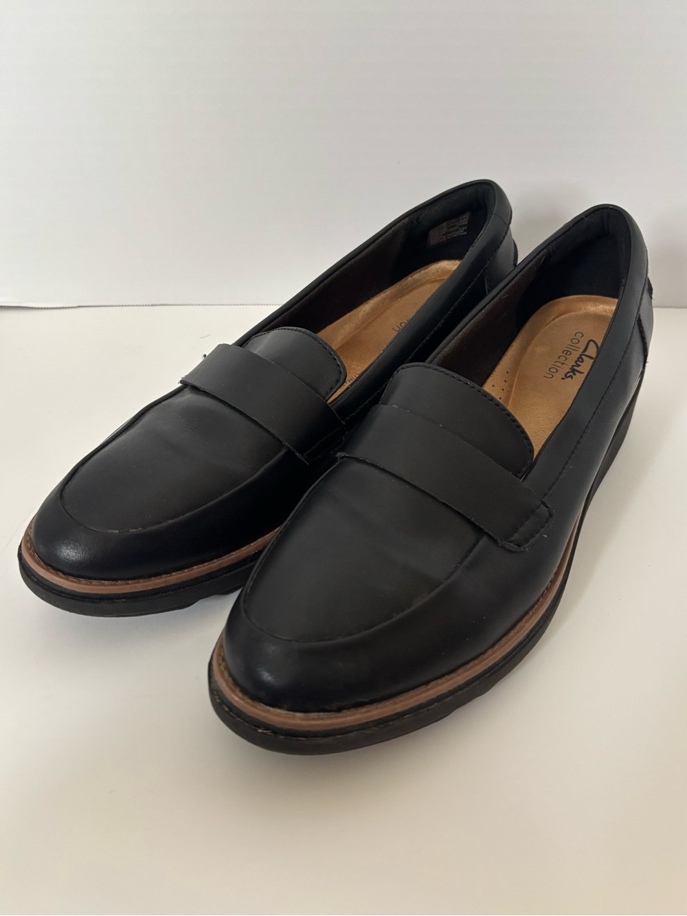 Clarks Black Leather Penny Loafers with Brown Accent Welt
